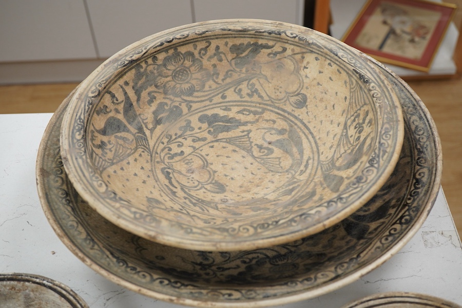 A group of Thai ceramic dishes, possibly Sukothai, largest 36cm
